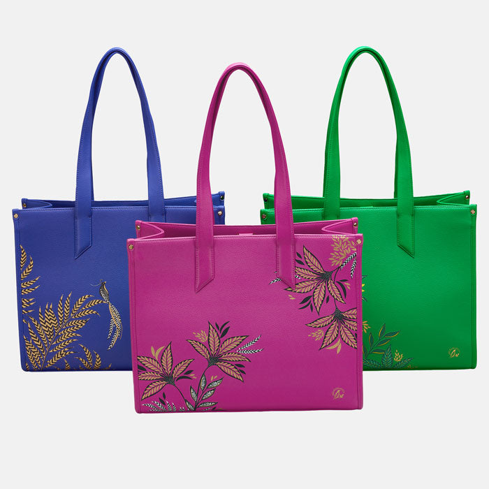 Blue, Pink and Green boxy totes all together. White background.