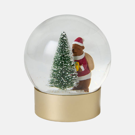 Snow globe with a bear and Christmas tree inside on a white background
