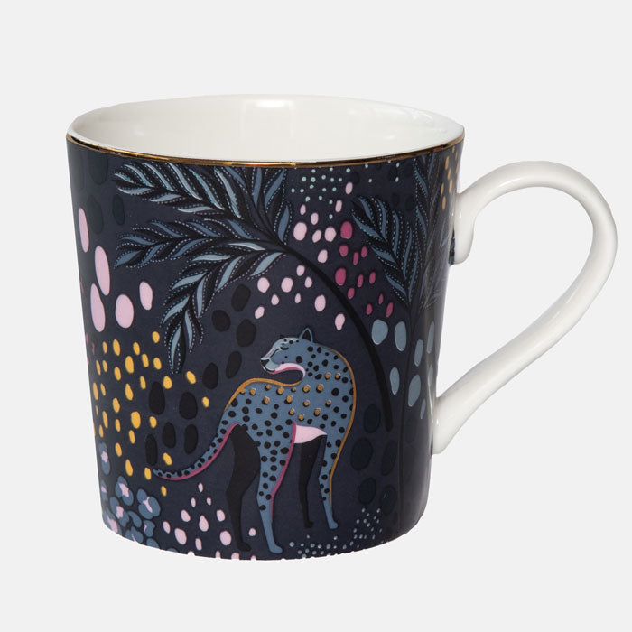 Midnight leopard mug on white background. Deep blue tones.