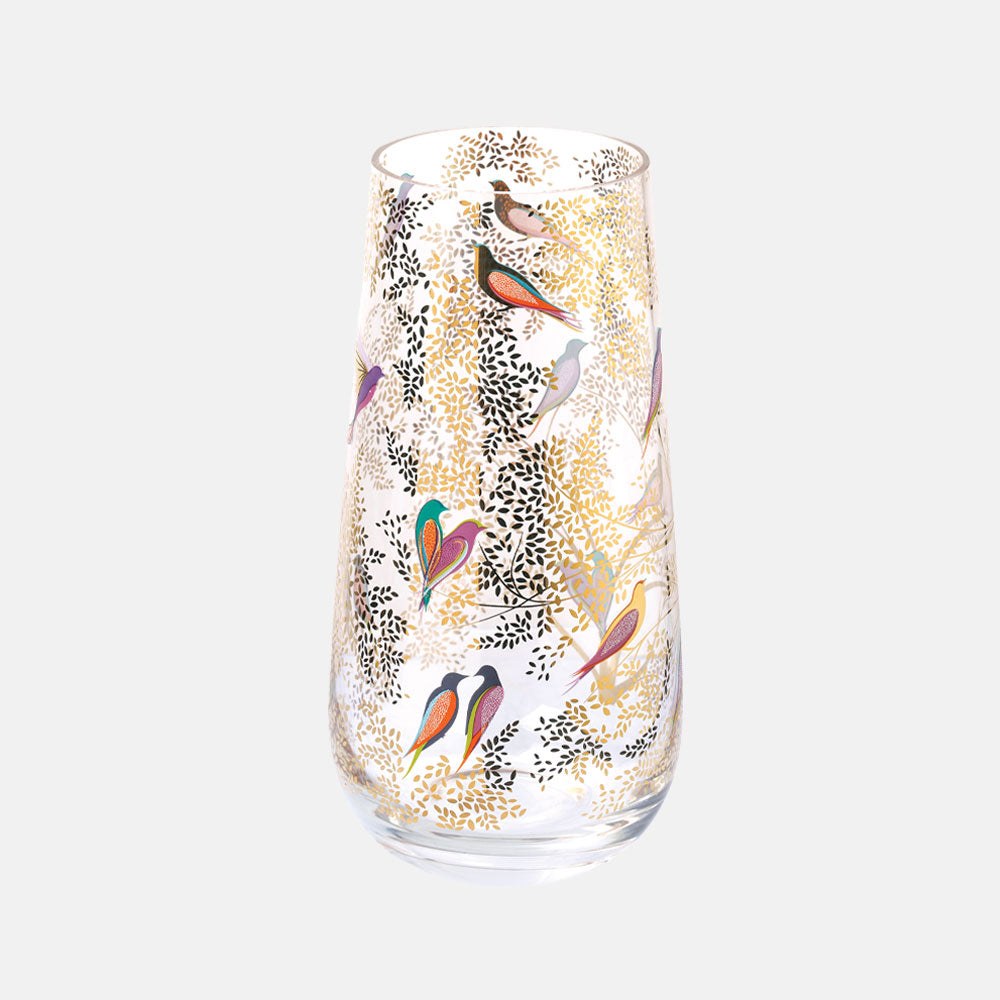 Vase shown close up on white background, detail seen in pattern.