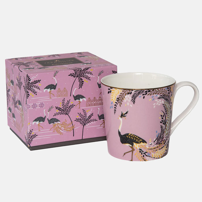 Mug next to matching gift box.