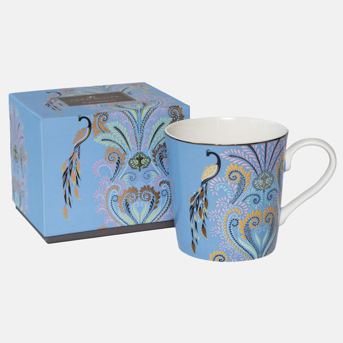 Mug next to matching gift box.