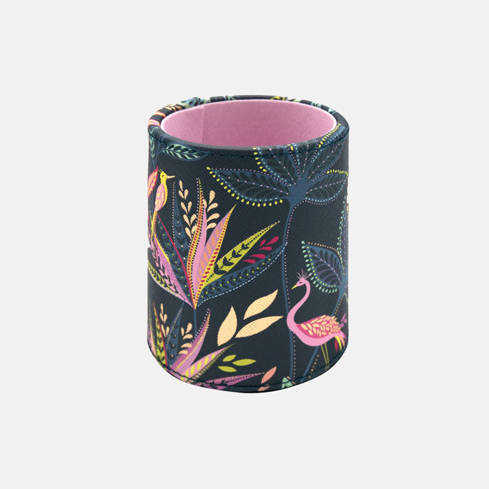 Cylindrical container with floral and flamingo pattern on a blue background
