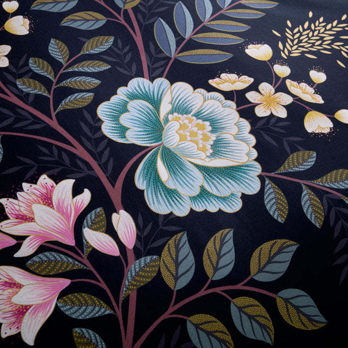 Floral pattern close up on a dark navy background