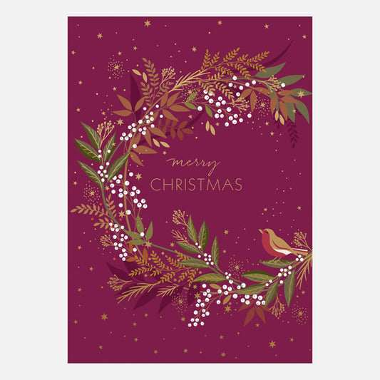 Christmas card with festive wreath and 'Merry Christmas' text on a purple background