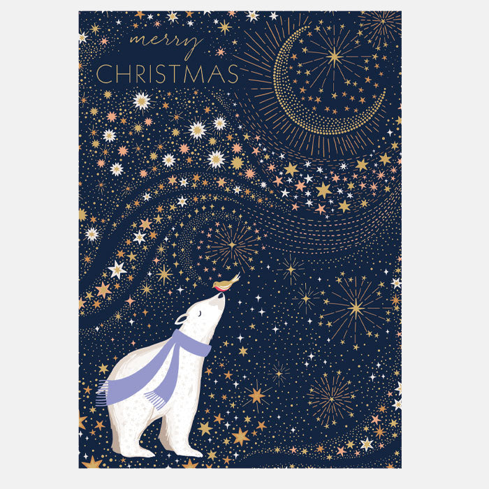 A festive Christmas greeting card featuring a polar bear wearing a purple scarf, looking up at a golden crescent moon and stars against a dark navy blue background. The text 'merry CHRISTMAS' is written at the top left.