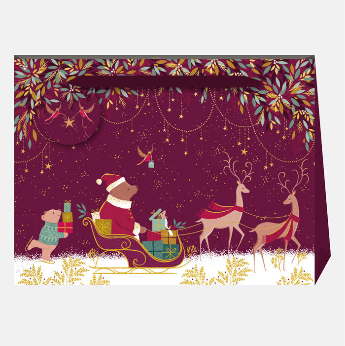 Christmas-themed illustration with Santa Claus, reindeer, and gifts on a purple background.