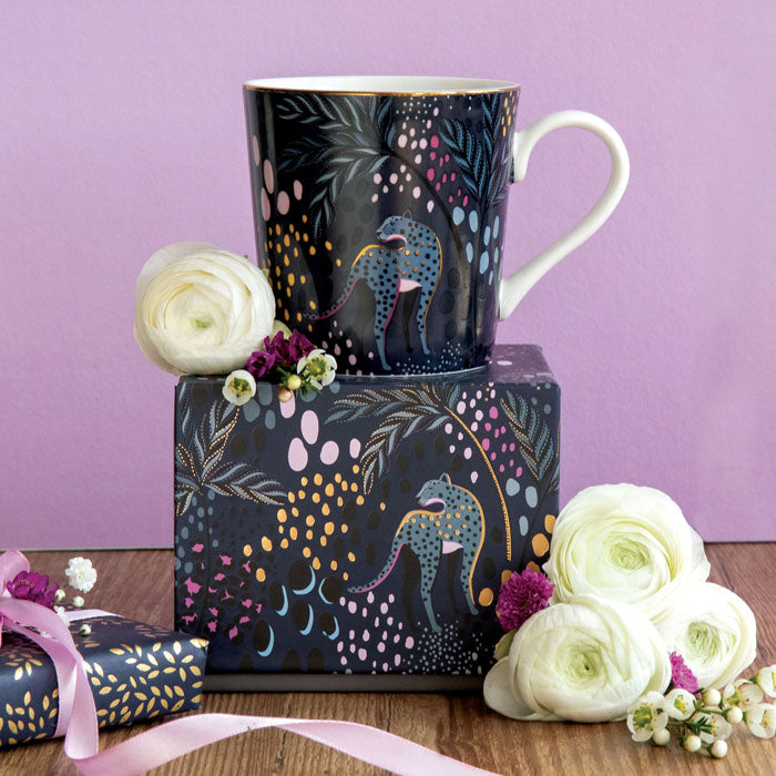 Mug on top of matching gift box.