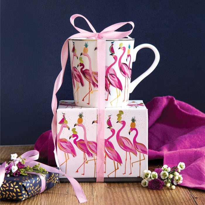 Mug on top of matching gift box with ribbon detail.
