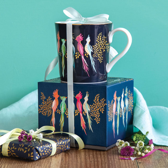 Mug on top of matching gift box with ribbon detail.