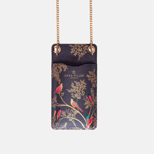 Phone pouch in deep navy with colourful birds and branches design, gold chain strap.