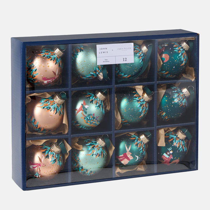 Set of decorative Christmas baubles in a box with branding.