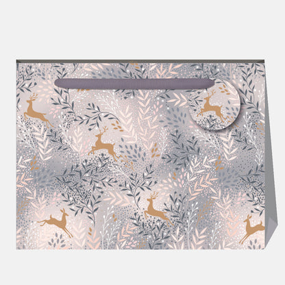 Sara Miller London gift bag with deer and floral pattern on a light grey background
