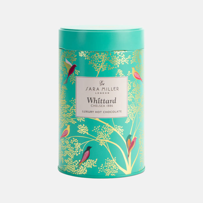 Hot chocolate tin with Green Birds 'Sara Miller Whittard' branding on a white background.