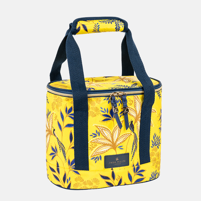 Yellow cooler bag with blue floral pattern on a white background