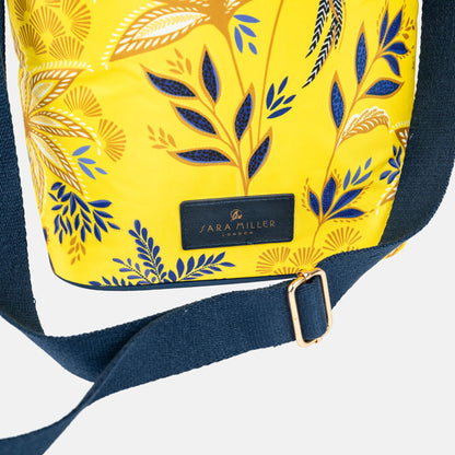Yellow cooler bag with floral pattern and 'Sara Miller London' label on a white background
