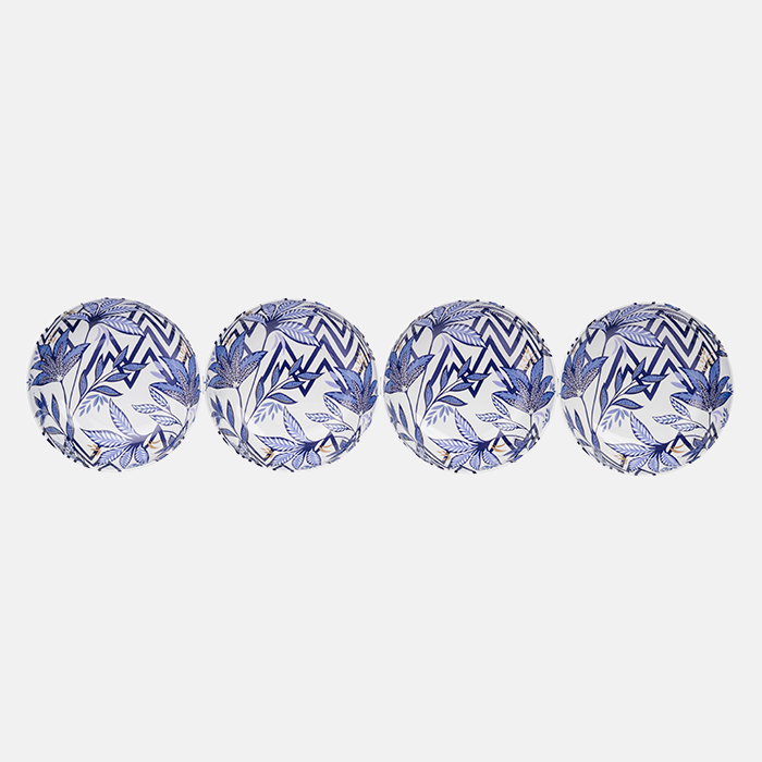 Four patterned plastic bowls with blue floral patterns on a white background