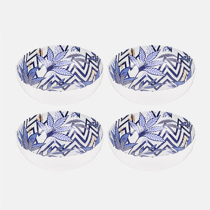 Four plastic bowls with blue and white patterns on a white background