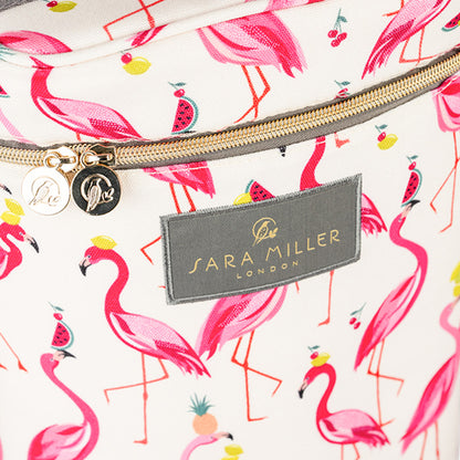 Close up of gold embossed zips and Sara Miller London logo