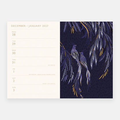 Shows inside of the diary on a weekly view page, with a print on the opposite page. 