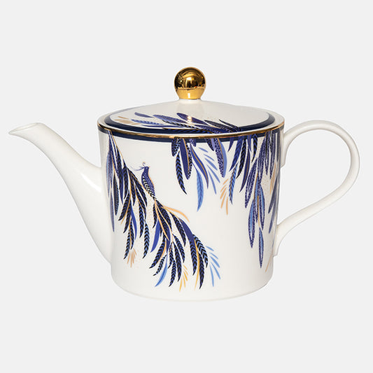 White teapot with blue peacock design and gold detailing.