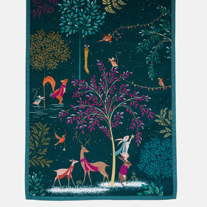 Close up of the green table runner, woodland animals decorating for the season.