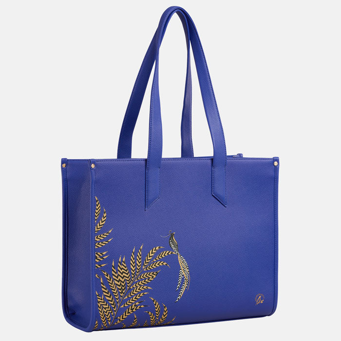 Blue Boxy Tote with botanic leaf design, white background.