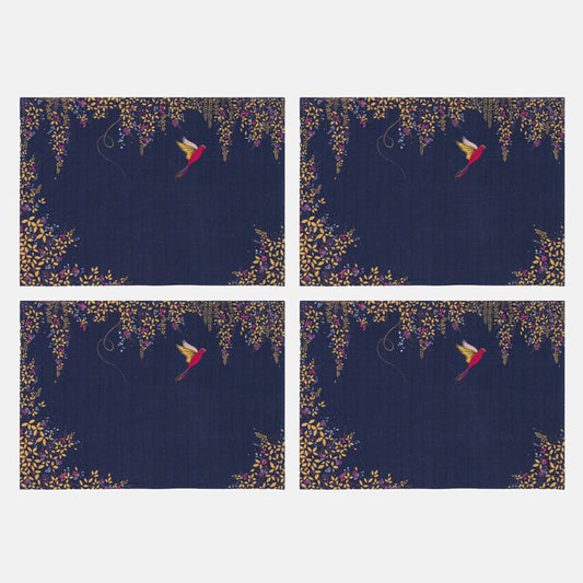 Four identical placemats with a floral design and bird silhouette on a navy background.