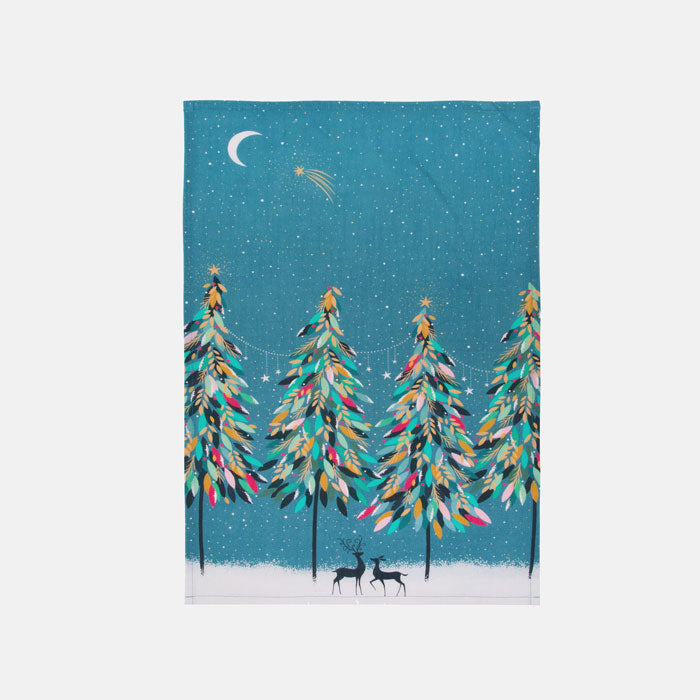 A festive kitchen tea towel with a colourful winter forest scene, silhouetted deers under a moonlit sky against a soft blue background.