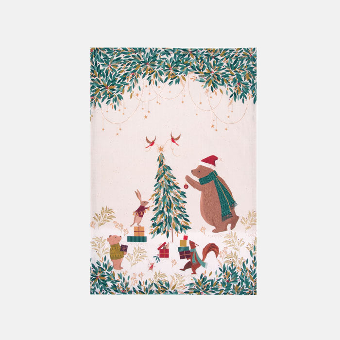Festive tea towel with bear and woodland creatures decorating a Christmas tree on a cream background.
