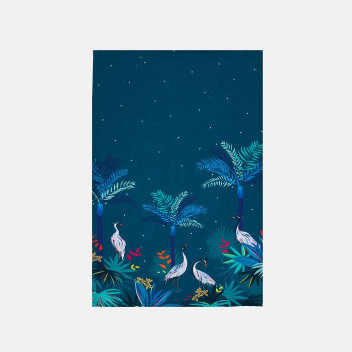 Fabric tea towel with white heron birds in a tropical lake scene, on a teal background