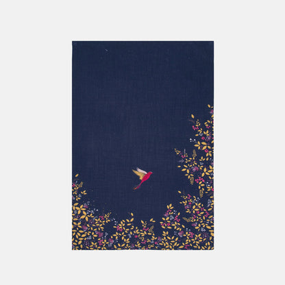 Navy blue fabric tea towel with floral and bird design on a navy background