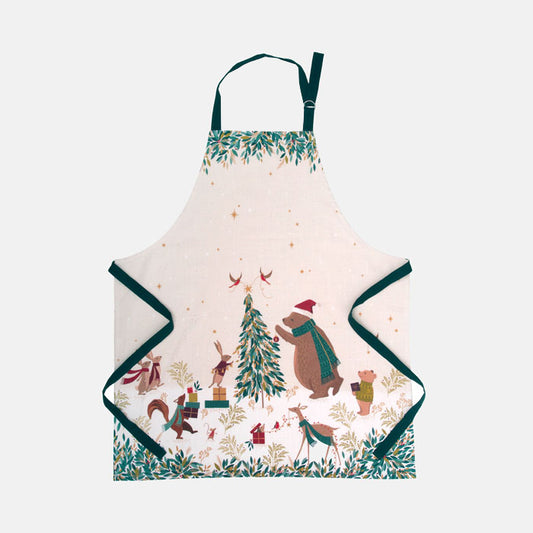 Christmas-themed apron with festive animals and decorations on a cream background