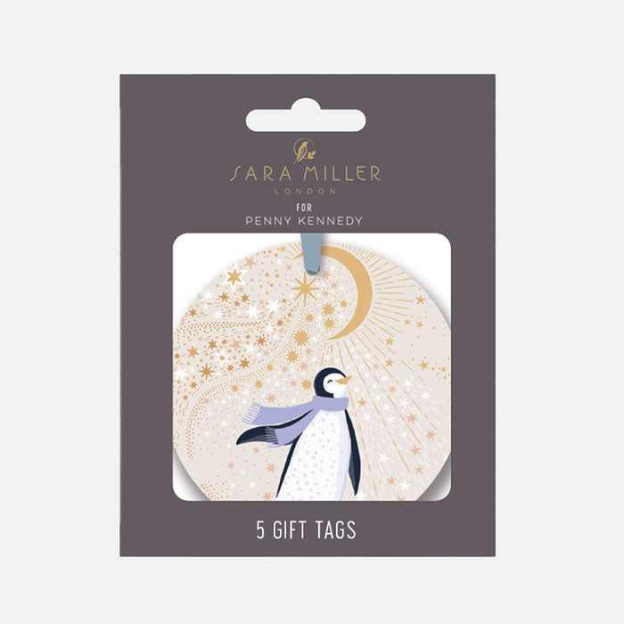 Sara Miller London gift tags in retail packaging, featuring a penguin and crescent moon design on a light cream background with gold stars.