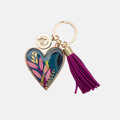 Heart-shaped keychain with floral design and purple tassel on a white background