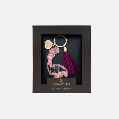Keychain with ostrich design and tassel in a grey box packaging, featuring the brand 'Sara Miller London'.