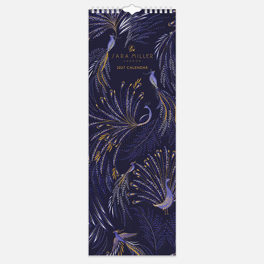 A slim hanging spiral bound wall calendar with intricate blue peacock design on the front with gold embellishment.