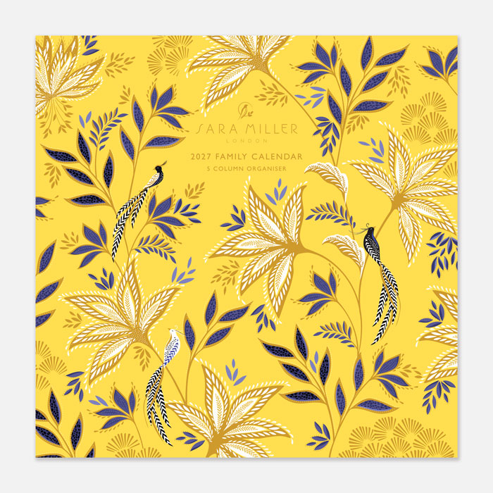 A square hanging wall calendar with yellow botanic design on the front.