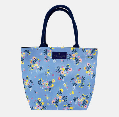 Floral-patterned tote bag with navy handles, blue bag.