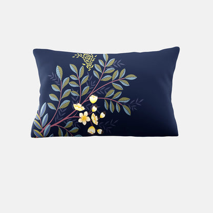 Decorative pillow with floral design on a navy background
