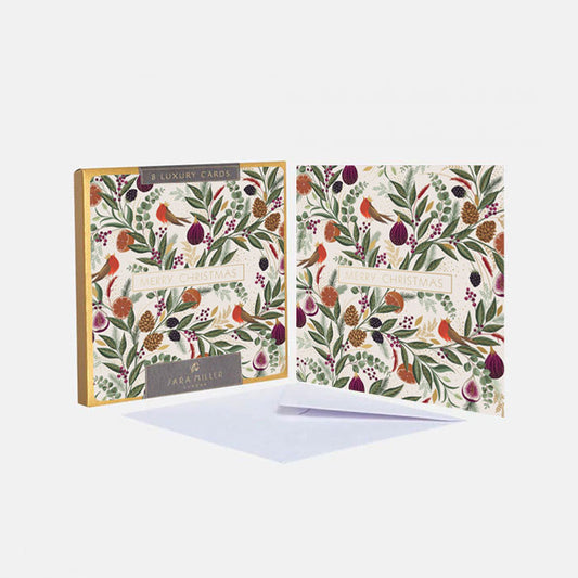A set of illustrated luxury greeting cards and envelopes featuring a festive foliage and fruits pattern on a cream background, in shades of green, red and plum with gold embellishment.