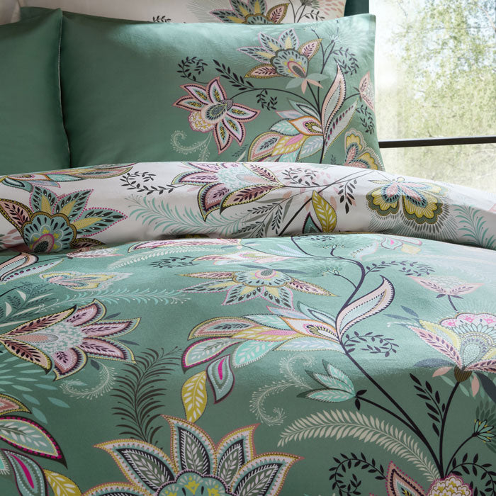 Floral patterned bedding set with green background