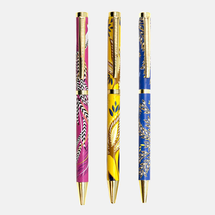 Set of three pens, one yellow, one cobalt and one fuchsia all in different floral designs.