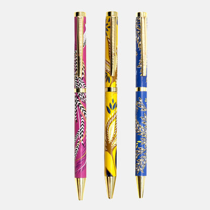 Set of three pens, one yellow, one cobalt and one fuchsia all in different floral designs.