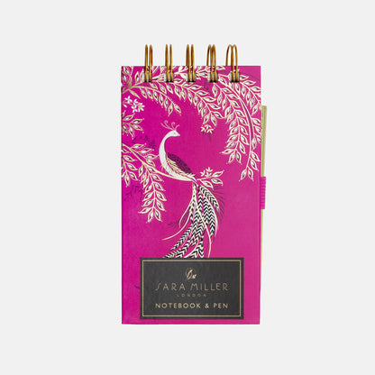 Fuchsia notepad and gold pen set with elegant bird design, gold embellishments.