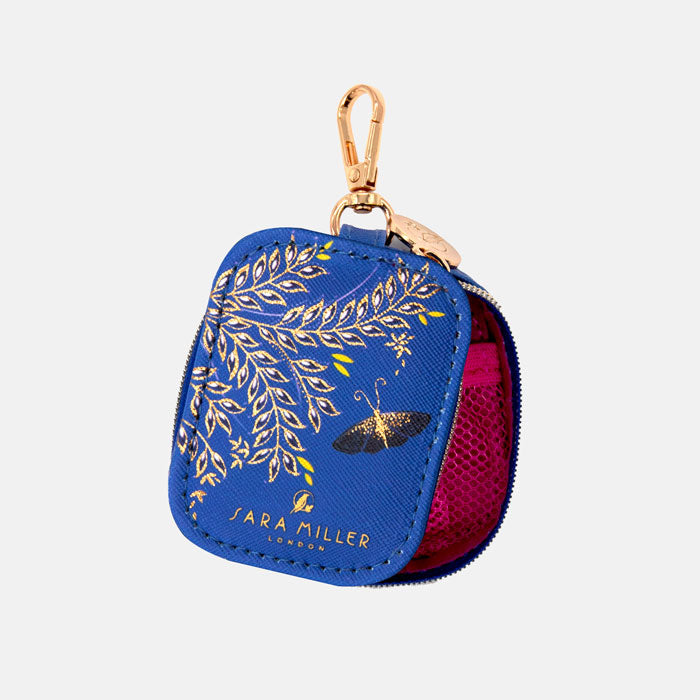 Cobalt earphones pouch with butterfly design and gold embellished details, and gold clip to attach to your bag. Shows fuchsia inside lining with elasticated mesh pocket.
