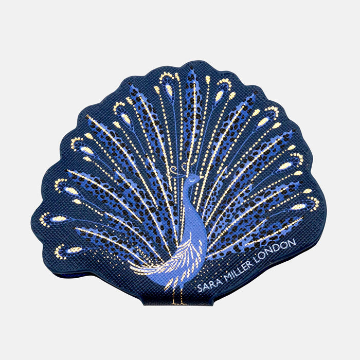 Compact mirror shaped like a peacock with blue and gold peacock design.