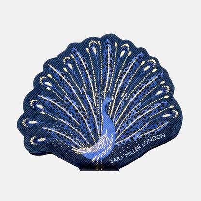 Compact mirror shaped like a peacock with blue and gold peacock design.