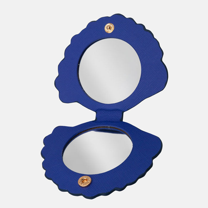 Mirror open, can see two mirrors inside and press stud closure.