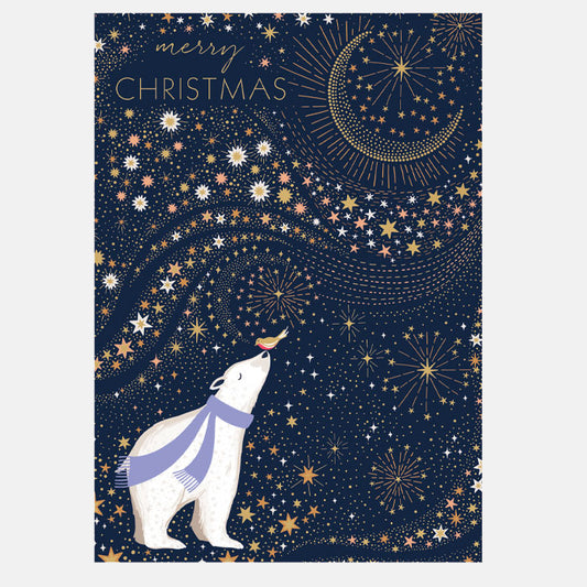 A festive Christmas greeting card featuring a polar bear wearing a purple scarf, looking up at a golden crescent moon and stars against a dark navy blue background. The text 'merry CHRISTMAS' is written at the top left.